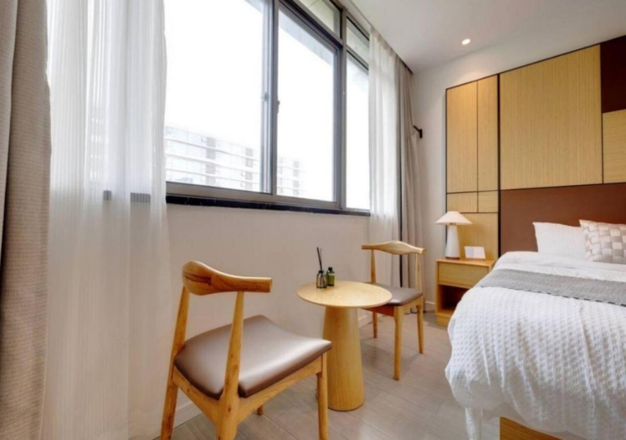 Yueshe Apartment - Hongqiao Longbai Xincun Шанхай Экстерьер фото