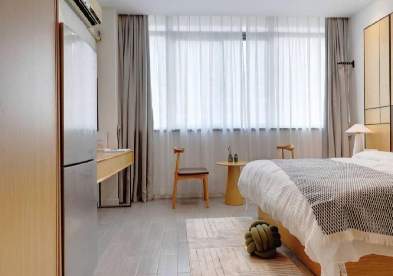 Yueshe Apartment - Hongqiao Longbai Xincun Шанхай Экстерьер фото